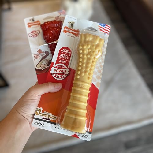Nylabone Power Chew Textured Bone Dog Toy, Peanut Butter Flavor, X-Large | Durable dog toys, long lasting, discourages destructive chewing, teeth-cleaning texture, flavor throughout, for dogs 50+ lbs - size: X-Large