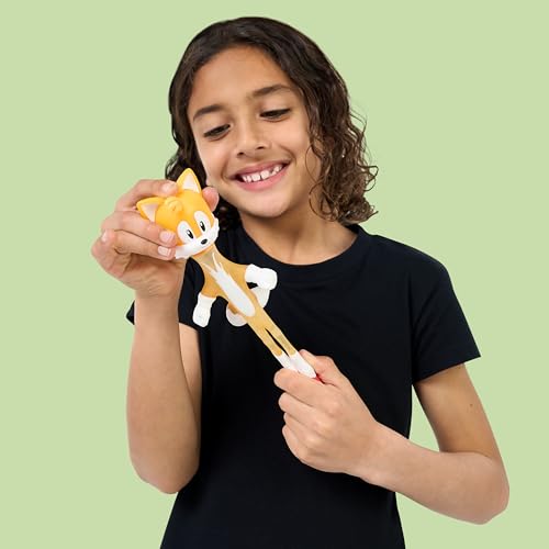 Heroes of Goo Jit Zu Stretch Surge Tails, Powered Up with Glow Surge Giving Him Glow-in-The-Dark Powers, Scrunchy, Stretchy Filling, Stretch Him Up to 3 Times His Size – Sensory Toys - style: Tails - Glow in the Dark
