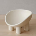 WENSHUO Elevated Cat Bowl, Ceramic Cat Food Bowl, 7 x 6.65 in, Matte Crème | 7 x 6.65 x 4.6 in four-leg ceramic cat bowl. Elevated anti-tip design supports comfortable feeding and helps reduce spills.